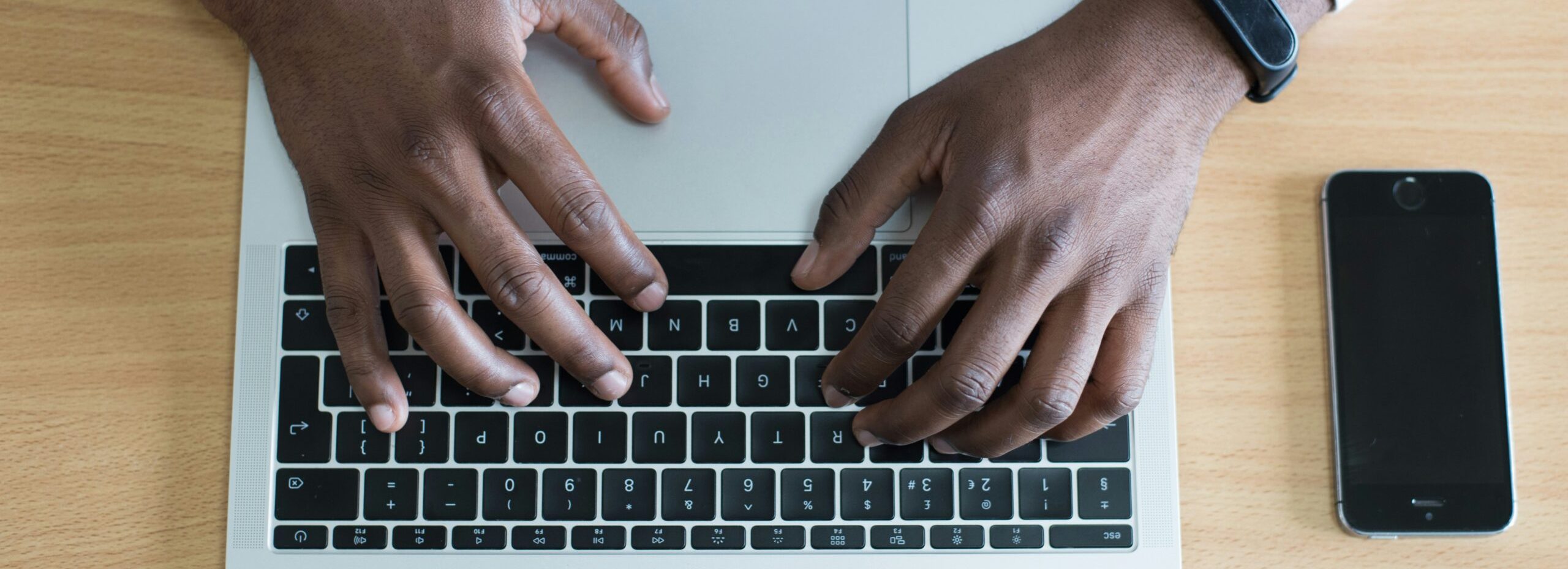 Man's Hands Typing